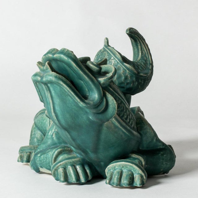Stunning, unique dragon sculpture by Wilhelm Kåge, made from stoneware with beautiful green glaze. Rare, large size. Very...
