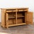 Danish pine sideboard with carved arches along two front door panels. Doors are flanked by elaborate turned half columns...