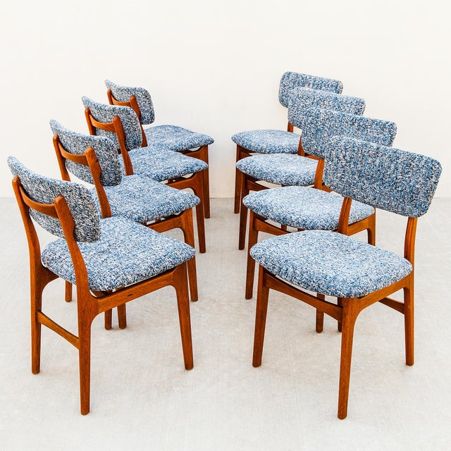 A delightfully dainty set of eight solid teak dining chairs, made in Denmark in the 1960s and newly reupholstered in a...