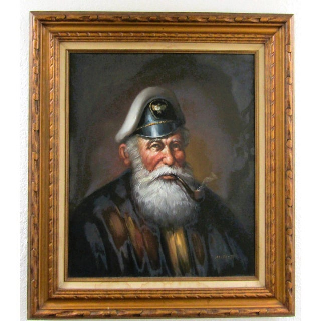 This M. King oil painting portrait of a sea captain smoking a pipe is a unique and one-of-a-kind piece created with a...