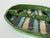 Unique 1980s studio pottery ashtray by Ellen Weinstein, handcrafted in an organic oval form with a raised sculptural...