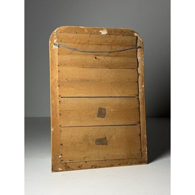 French Louis Philippe mirror. Originally from France, 19th century. The unique feature of this mirror is that the gilded...