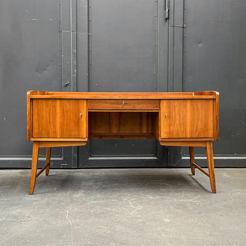 Product: desk style: mid-century · 1960s material: walnut veneer features: front: two doors · three drawers on the left ·...