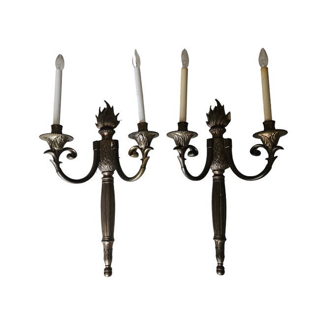 Neoclassical Regency Bronze Flame Motif Wall Sconces sold as found previously owned and used showing normal signs of age...