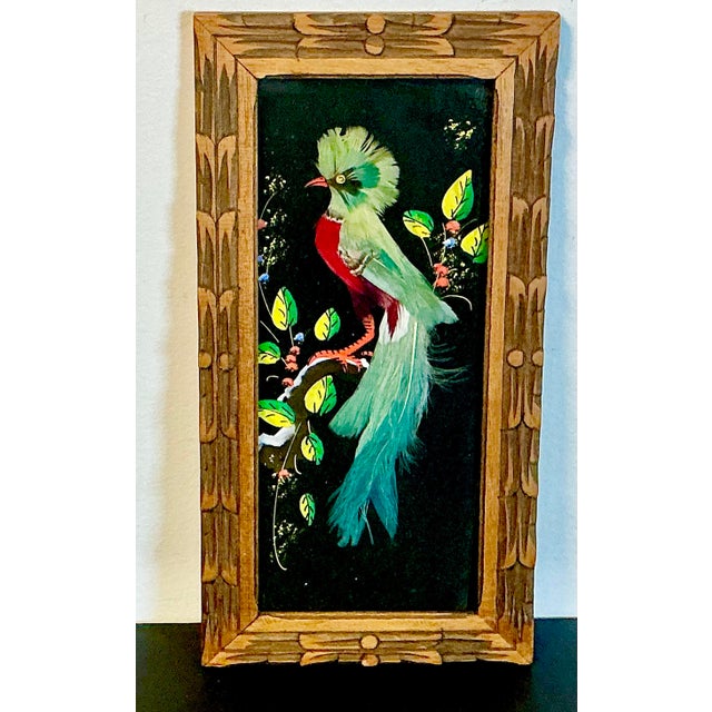 Gorgeous colors are featured in this vintage framed Feather Art Mixed Media Painting from Mexico. We love the colorful...