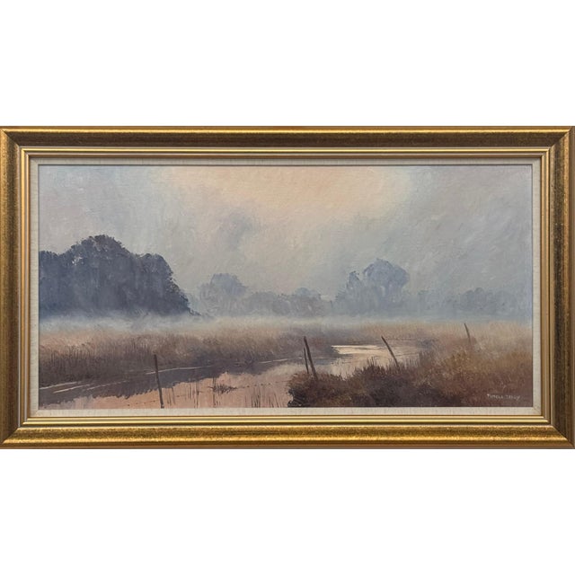 A serene river landscape at dawn with misty trees and soft, warm morning light 1987 Circa For Sale