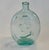 Antique American historical flask in aqua glass, circa 1850, featuring molded relief portraits of George Washington and...