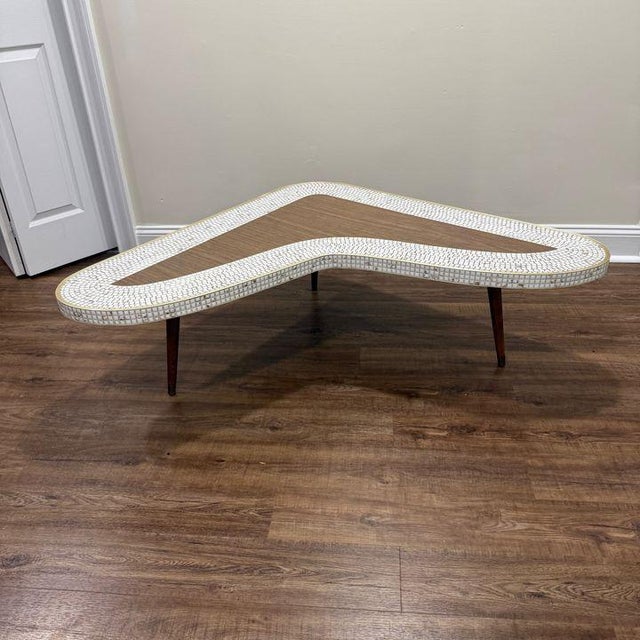 Vintage Mid Century Tile Inset Cocktail Table Shaped in the atomic-era boomerang style, this super cool vintage cocktail...