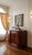 Museum-Quality French Art Deco Flame Mahogany Sideboard with Limousin Bronze Hunt Sculpture A breathtaking example of...