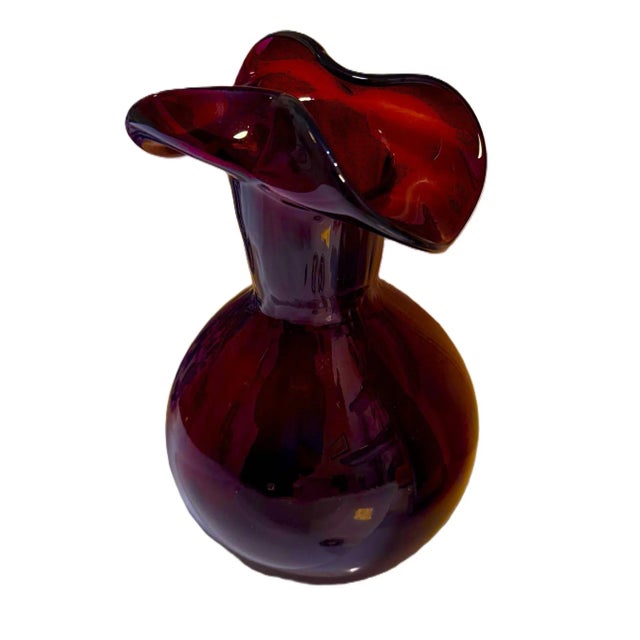 VIETRI Amethyst Purple Art Glass Folded Rim Vase. Mid-Century. The color is a deep purple hue that can shift from a smoky...