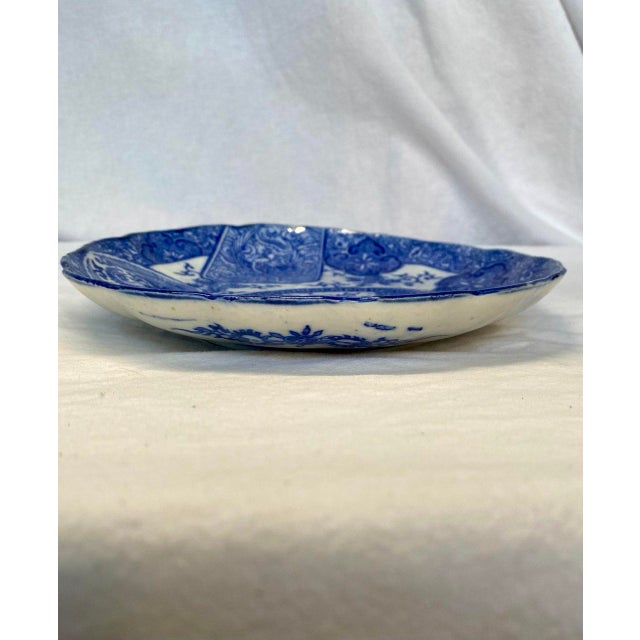 There is something quietly sculptural about this piece. A 19th century Chinese blue and white porcelain plate featuring a...