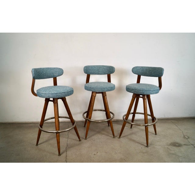 Set of three 1960's Mid century Modern barstools for sale. They were manufactured here in Los Angeles by Calorator Bar...