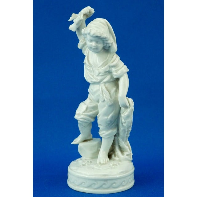 Description of the item: Wonderful figurine depicting a child fisherman, made of fine white hard-paste porcelain, signed...
