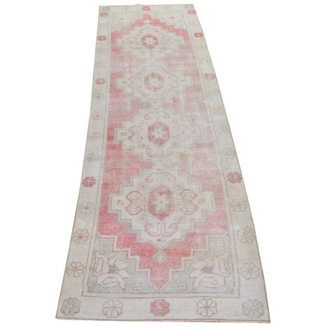 Hand-knotted with care using traditional rug-making techniques, this wool rug blends timeless craftsmanship with a modern...