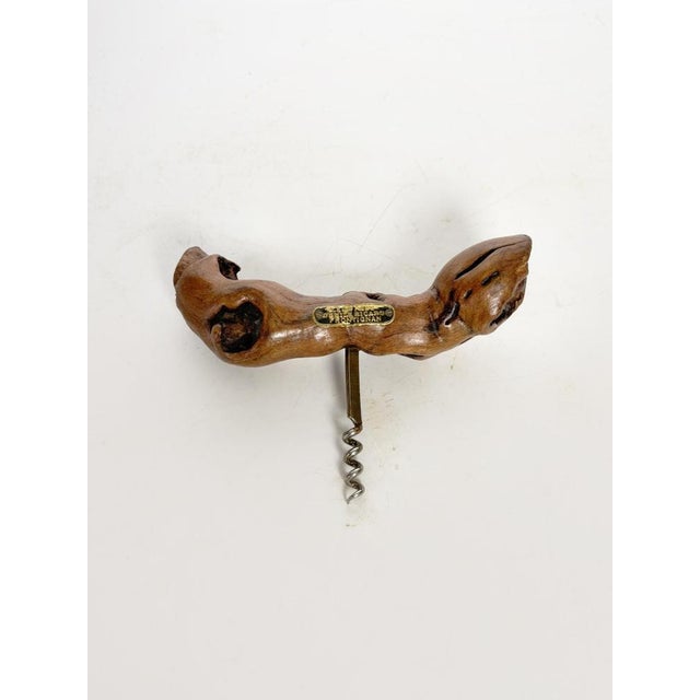 Provençal corkscrew in natural wood and metal, made in France around 1950. Its handle, carved from a branch or root,...