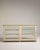 A decorative vitrine featuring faux bamboo detailing, reflecting the European fascination with Asian-inspired design...
