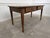 Measuring 153 cm in length, this antique 1930s farmhouse table is crafted entirely from high-quality solid oak. Cleaned...