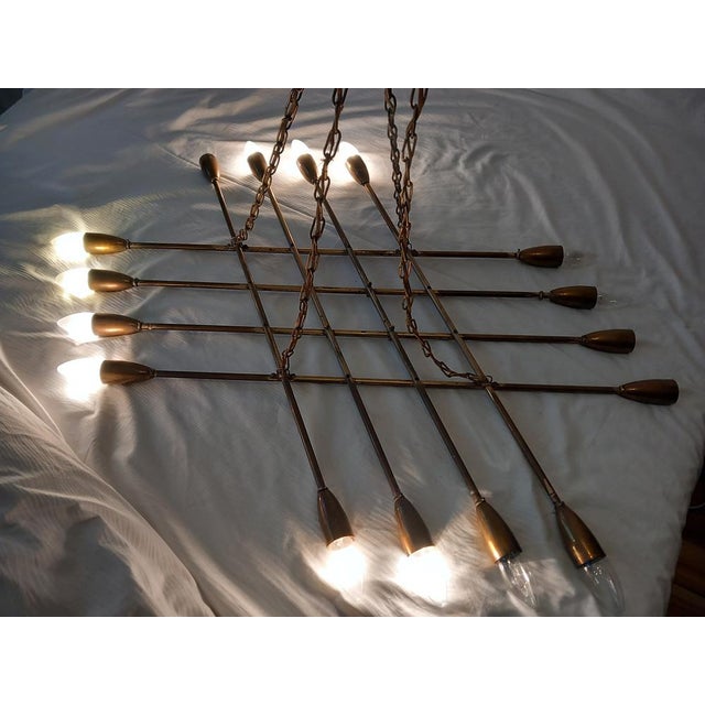 The chandelier is equipped with 16x E14 sockets, has a strong age-related patina, and the electrical wiring must be...