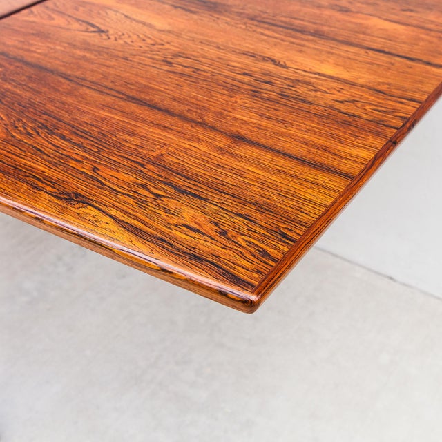 Mid-Century Modern 1960s Restored Danish Mid Century Modern Rosewood Hidden Leaf Dining Table For Sale - Image 3 of 12