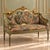 Create an elegant European-inspired focal point with this ornate French-style settee sofa, featuring richly patterned...