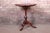 An exceptional carved mahogany tilt top tea table By Baker Furniture "Historic Charleston Collection" USA, Circa 1980s...