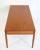 Restored Mid-Century Modern coffee table designed by Grete Jalk and made in Teak by France & Son, Denmark 1960s. The main...