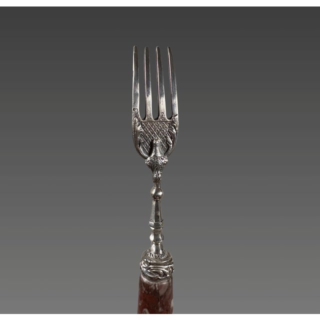 16th-Century Silver and Porphyry Fork Northern Italian work, circa 1550 The cylindrical handle of red/purple porphyry (a...
