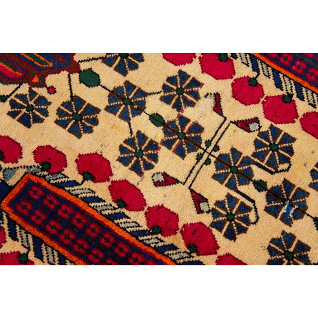 Beautiful vintage Persian Bidjar hand-knotted wool rug with a navy blue field. This piece has a blue frame and multicolor...