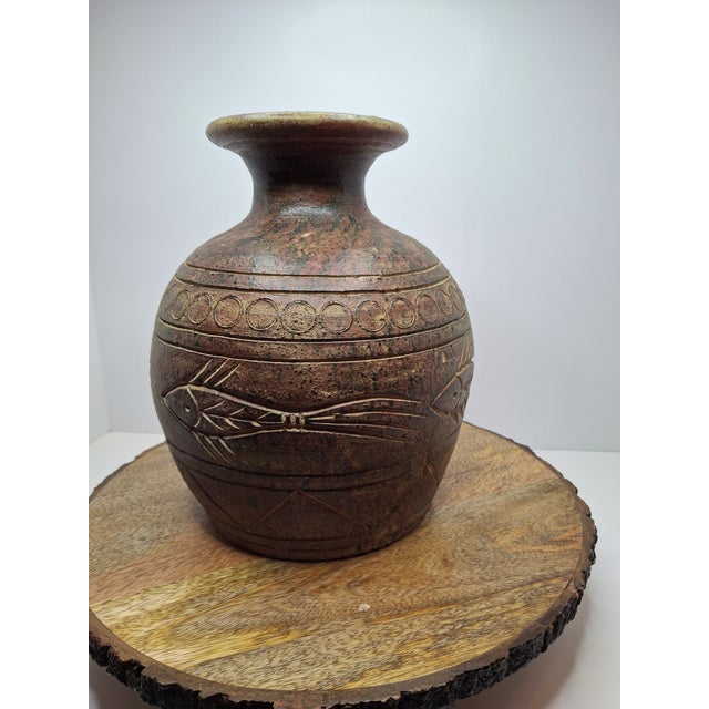 This striking vintage soapstone vase is a fine example of traditional Kenyan Gusii craftsmanship, hand-carved from a...