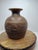 This striking vintage soapstone vase is a fine example of traditional Kenyan Gusii craftsmanship, hand-carved from a...