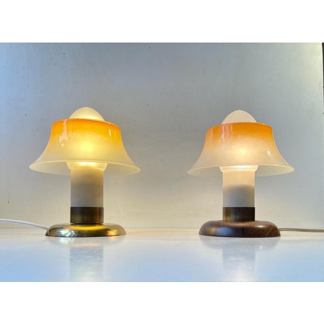 A rare set of small table lights. They are made from brass and frosted/partially painted single layered glass. Please...