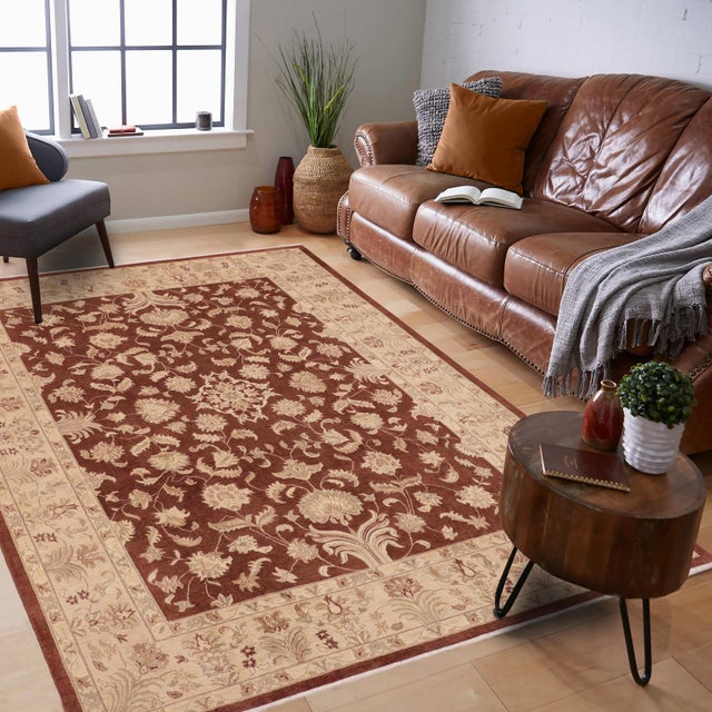 "Enhance the ambiance of your home with this magnificent Persian-influenced Turkish hand-knotted rug made by skilled...