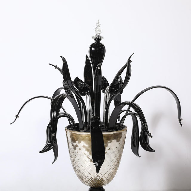 This Mid-Century Modernist uplight table lamp, hand-blown in Murano, Italy, showcases the unparalleled artistry of...