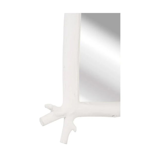 The faux bois white finished Grotto Mirror will give any home a taste of sophistication. Designed by Kristi Nelson.