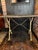 This antique French bistro table features a naturally weathered cream and ochre yellow cast iron base paired with a dense,...