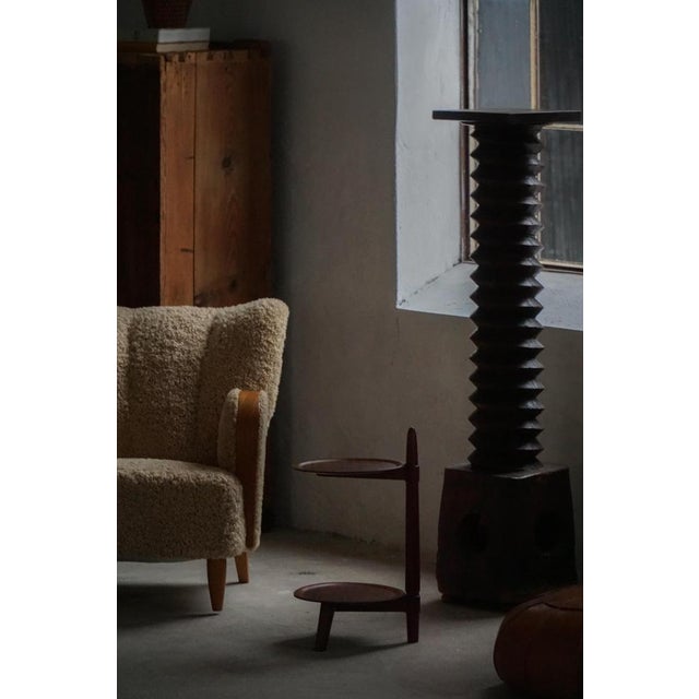 A charming two tier side table, made by Edmund Jørgensen in Denmark in the 1950s. It comes with two circular shelves made...