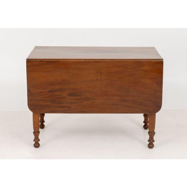 American Federal Mahogany Drop Leaf Table, on four turned wood legs. Closed: 29" H x 41" W x 25" D. Provenance: From the...