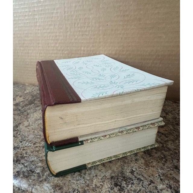 This vibrant vintage set of Reader’s Digest Condensed Books features rich red and green covers with gold detailing, dating...