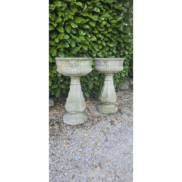 Very good pair of weathered reconstituted garden planters onplinths, come into two for transport, in overall very good...