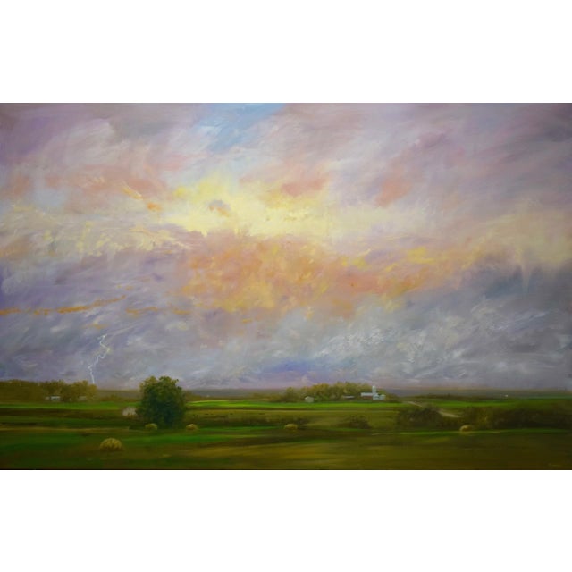 Approaching Storm captures the dramatic interplay of light and shadow as an impending storm looms over a tranquil...