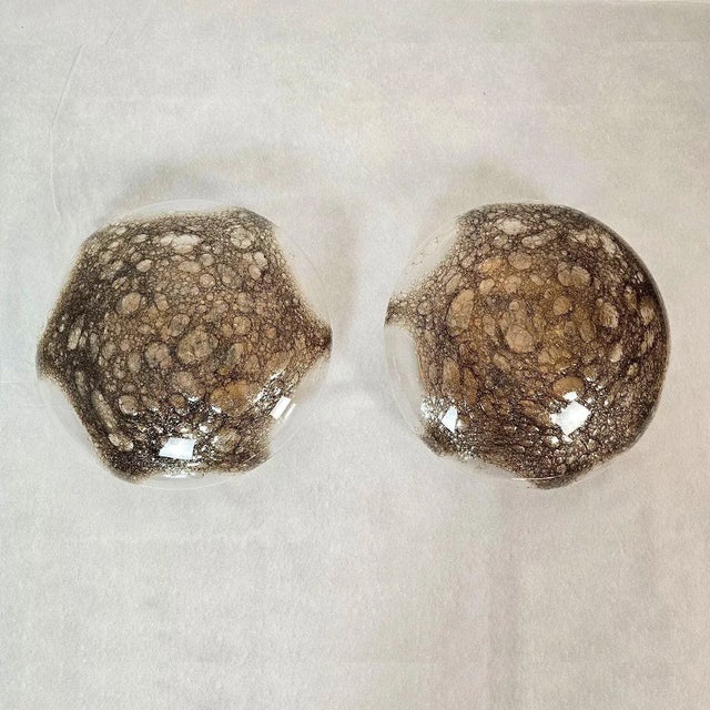 Pair of round Mid Century Modern sconces attributed to Carlo Nason for Mazzega Italy 1960s. The Mid Century Modern wall...