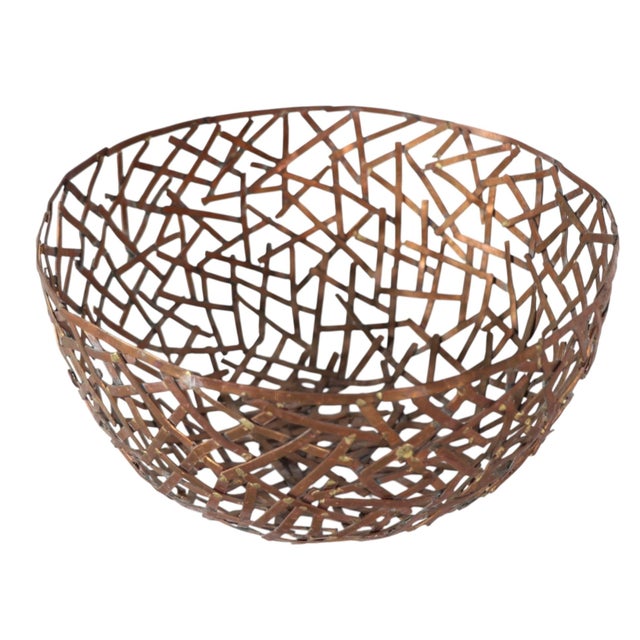 Handmade Brutalist birds nest style decorative bowl, constructed of copper segments joined by brass welds. This example is...