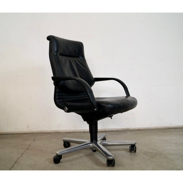 1980's Post Modern leather executive office desk chair for sale. It was designed by Fritz Makiol for Girsberger, and was...