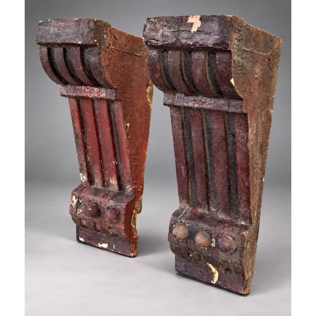 These corbels, with their fluted shafts and acanthus leaf carvings, are characteristic of the ornate detailing from the...