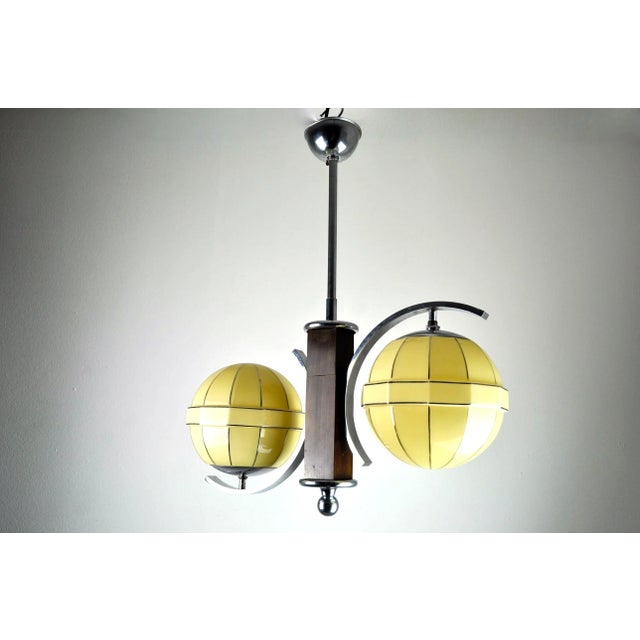 Mid-Century Modern Chrome and Wood Ceiling Lamp, in Very Good conditions. Designed 1960 to 1969 Up to 250V (Europe/UK...