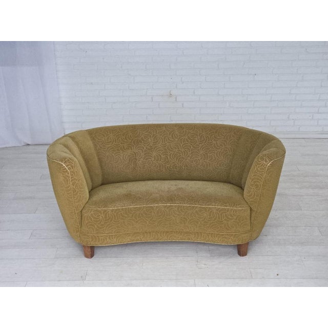 1960s, Danish 2-seater "Banana" sofa. Original green furniture velour, beech wood legs, brass springs in the seat....