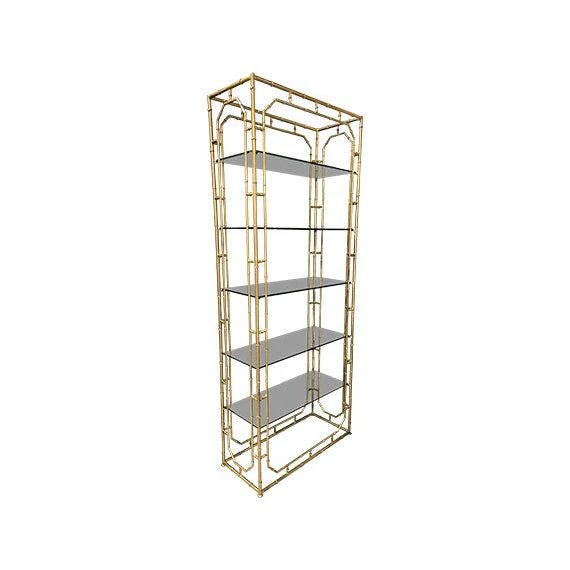 Elegant and airy, this gold faux bamboo étagère brings timeless sophistication to any space. Featuring a slim vertical...