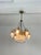 7-light Art Deco chandelier in brass and glass, 1940s Six arms, colored fringe. E27 bulbs. Good condition, small signs of...