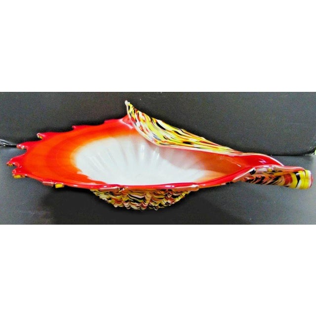 1950s Murano Art Glass Vibrant Confetti Handblown Scalloped Conch Rim Centerpiece Bowl Measures 19" wide, 12 1/2" deep and...
