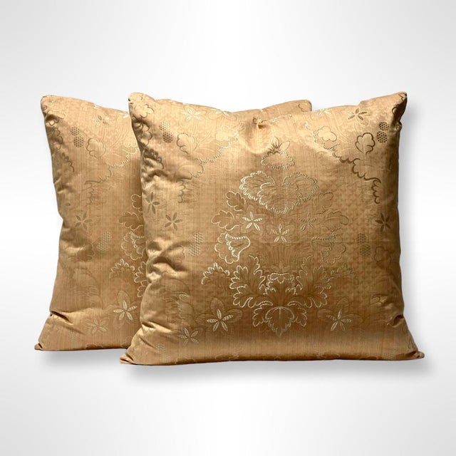 Custom-tailored 20” pillows in Scalamandre “Villa Lante Unito” color salmon. Cream color silk back. Hidden zipper closures...